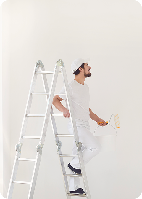 Professional painter on a ladder holding a paint roller and bucket, preparing to deliver quality painting services for homes and properties in Canberra.